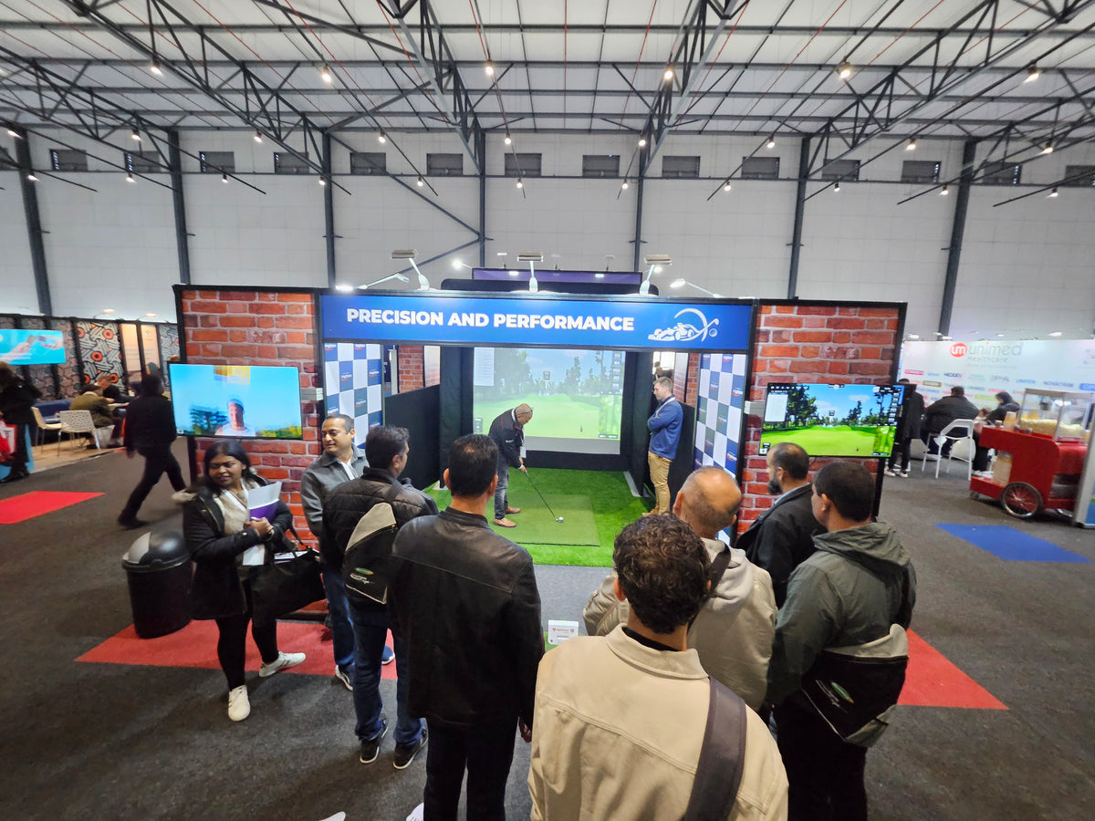 Mobile golf simulator activation setup at exhibition tradeshow booth